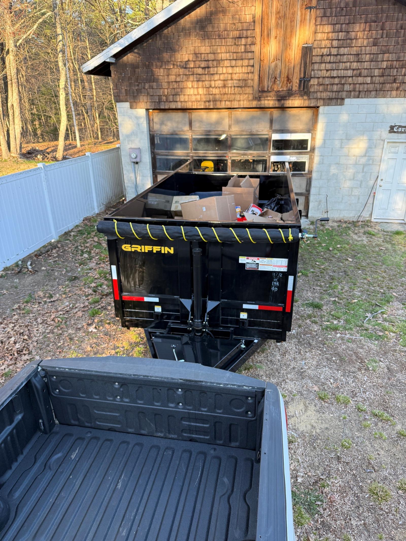 Dump trailer loaded during garage cleanout